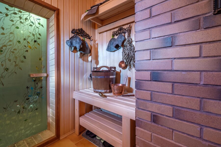 standard-design-classic-wooden-russian-bath-sauna-interior-with-hot-stones_97694-14585.jpg